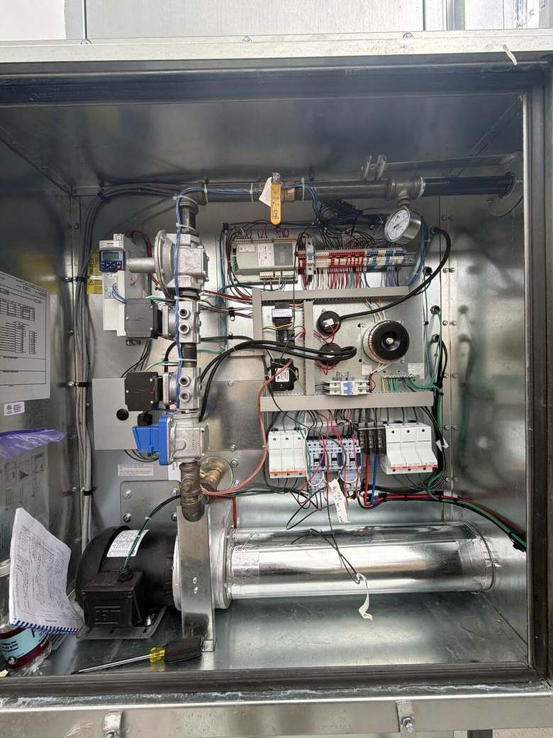 Interior of a control cabinet during electrical troubleshooting